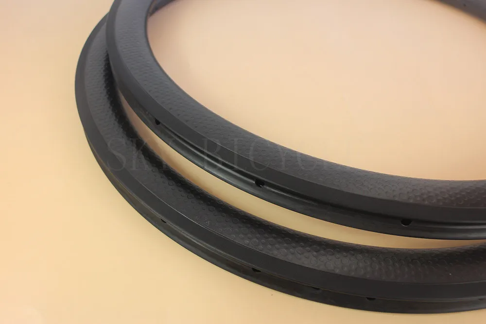 Dimpled surface 45mm Tubular 18/24H road bike rims 26mm width UD dimpled finish carbon bicycle rims w/ basalt brake track
Dimpled surface 45mm Tubular 18/24H road bike rims 26mm width UD dimpled finish carbon bicycle rims w/ basalt brake track
