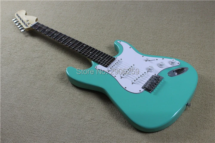 Classical green st electric guitar, special customization scalloped rosewood fingerboard guitar.
Classical green st electric guitar, special customization scalloped rosewood fingerboard guitar.