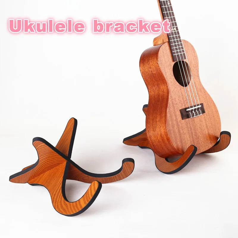 Foreign Trade New Ukulele Violin Wooden Ukulele Small Guitar Folding Vertical Bracket
Foreign Trade New Ukulele Violin Wooden Ukulele Small Guitar Folding Vertical Bracket