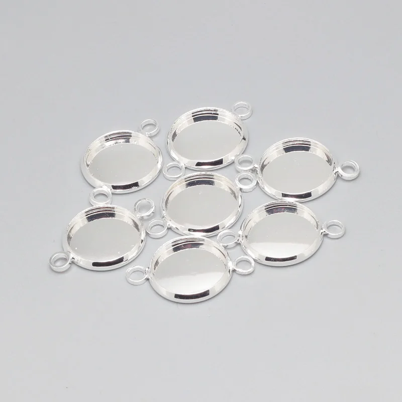 Silver Plated Metal Copper 12mm Diplopore Round Cabochon Settings Pendant Jewelry Blanks Jewelry Connector 30pcs/lot 8029
Silver Plated Metal Copper 12mm Diplopore Round Cabochon Settings Pendant Jewelry Blanks Jewelry Connector 30pcs/lot 8029