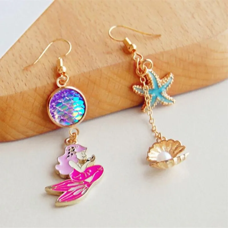 Timlee E160 New Beautiful Fashion Mermaid Earring Starfish Shell Imitation Pearl Asymmetric Alloy Drop Earrings Wholesale
Timlee E160 New Beautiful Fashion Mermaid Earring Starfish Shell Imitation Pearl Asymmetric Alloy Drop Earrings Wholesale