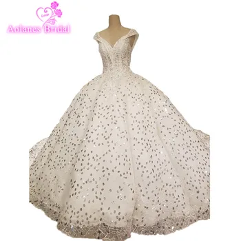 AOLANES 2018 Full Crystals Sleeveless Light Champagne Tulle V-neck Cathedral Train Lace Up Ball Gown Wedding Dresses Gowns
AOLANES 2018 Full Crystals Sleeveless Light Champagne Tulle V-neck Cathedral Train Lace Up Ball Gown Wedding Dresses Gowns