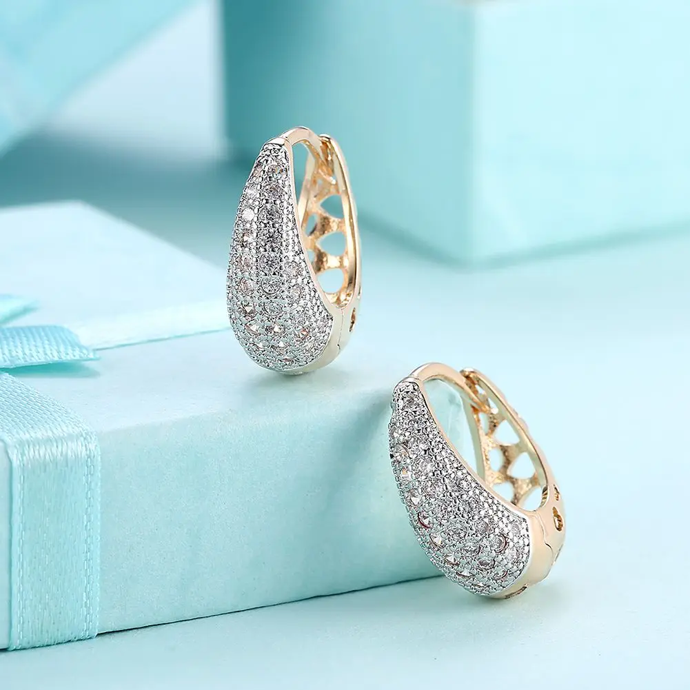 Top Luxury hoop Earrings with AAA Zircon Fashion Classic Woman Champagne Gold Color Moon boat shape
Top Luxury hoop Earrings with AAA Zircon Fashion Classic Woman Champagne Gold Color Moon boat shape
