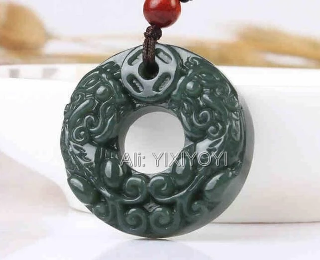 Beautiful Carved Oval Natural White Jade Dragon Pendant
