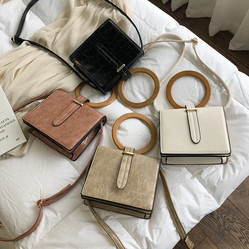 Brand Originality Design Korean version of small square bag women's wooden handle handbag shoulder diagonal bag bag for women
Brand Originality Design Korean version of small square bag women's wooden handle handbag shoulder diagonal bag bag for women