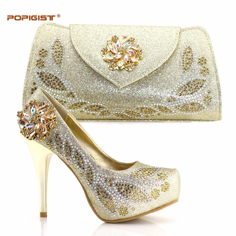 Nigerian Party Shoe and Bag Set Gold Color With Shining Rhinestone Women Shoes and Bag Set Italy Thin Heels Women Pumps
Nigerian Party Shoe and Bag Set Gold Color With Shining Rhinestone Women Shoes and Bag Set Italy Thin Heels Women Pumps
