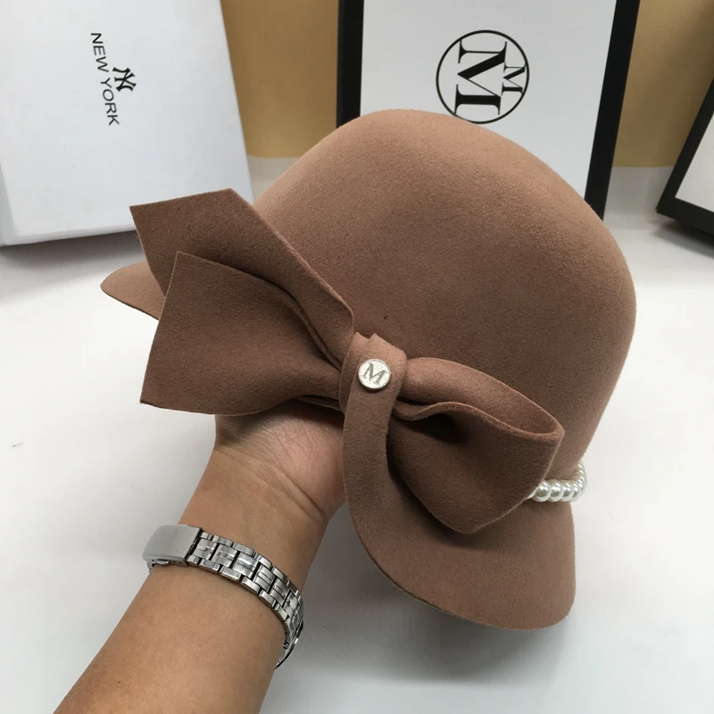 Elegant pearl woollen bowler hat south Korean version of joker khaki hat female fisherman hat fashion goddess felt hat
Elegant pearl woollen bowler hat south Korean version of joker khaki hat female fisherman hat fashion goddess felt hat