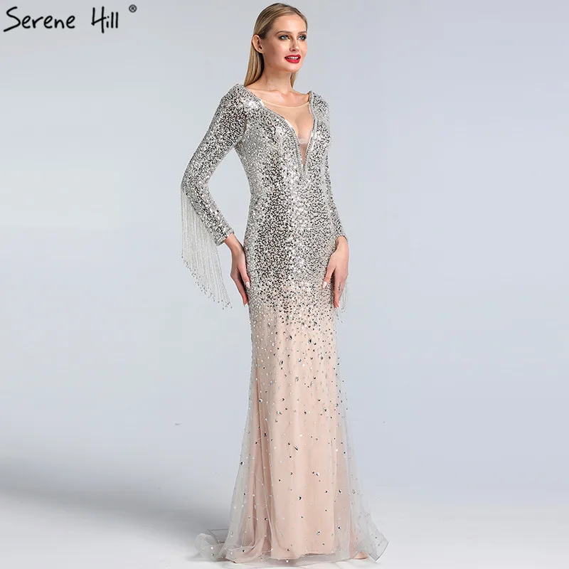 Silver Nude Dubai Design Luxury Prom Dresses Diamond Tassel Long Sleeves Prom Gowns 2019 Serene Hill BLA60962
Silver Nude Dubai Design Luxury Prom Dresses Diamond Tassel Long Sleeves Prom Gowns 2019 Serene Hill BLA60962
