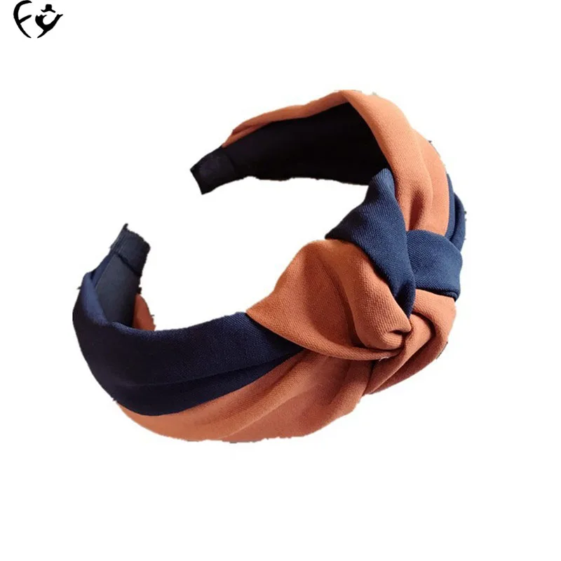 Europe and the United States new high - grade cloth art cross - spell color headband FY18052909
Europe and the United States new high - grade cloth art cross - spell color headband FY18052909