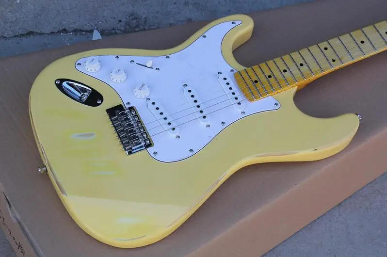 Factory custom yellow body left hand Electric Guitar with white pickguard Maple Fretboard as you request free shipping
Factory custom yellow body left hand Electric Guitar with white pickguard Maple Fretboard as you request free shipping