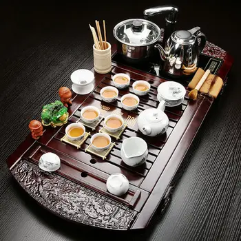 Chinese Purple Sand Tea Set Home Kung Fu Teapot Teacup Four-in one Induction Cooker Tea Table Solid Wood Tea Tray
Chinese Purple Sand Tea Set Home Kung Fu Teapot Teacup Four-in one Induction Cooker Tea Table Solid Wood Tea Tray