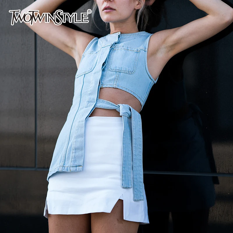 TWOTWINSTYLE Sexy Sleeveless Denim Vest Off Shoulder Lace Up Hollow Out Tops Big Size Irregular Jeans Vests Female Clothing Tide
TWOTWINSTYLE Sexy Sleeveless Denim Vest Off Shoulder Lace Up Hollow Out Tops Big Size Irregular Jeans Vests Female Clothing Tide