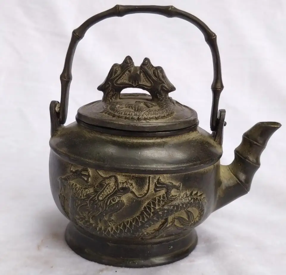 Chinese Antique Teapot collection old bronze carved Dragon Tea pot home art decoration Metal pot 00013
Chinese Antique Teapot collection old bronze carved Dragon Tea pot home art decoration Metal pot 00013