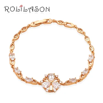 ROLILASON Classic design flower shaped crystal white Zircon golden bracelets for women party Health fashion jewelry TB499
ROLILASON Classic design flower shaped crystal white Zircon golden bracelets for women party Health fashion jewelry TB499