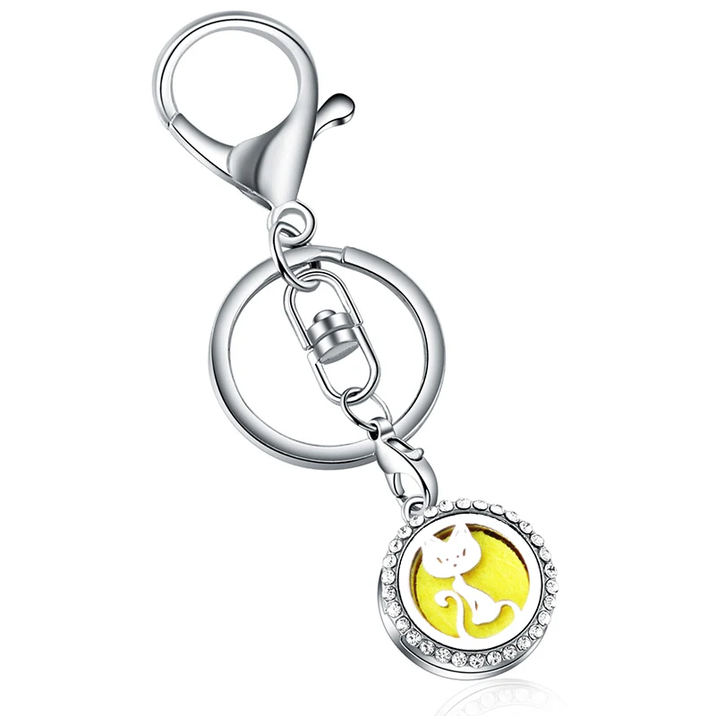 Cute Zircon Cat Aroma Keychain Stainless Steel Perfume Diffuser Charm Fashion Aromatherapy Essential Oil Diffuser Locket jewelry
Cute Zircon Cat Aroma Keychain Stainless Steel Perfume Diffuser Charm Fashion Aromatherapy Essential Oil Diffuser Locket jewelry