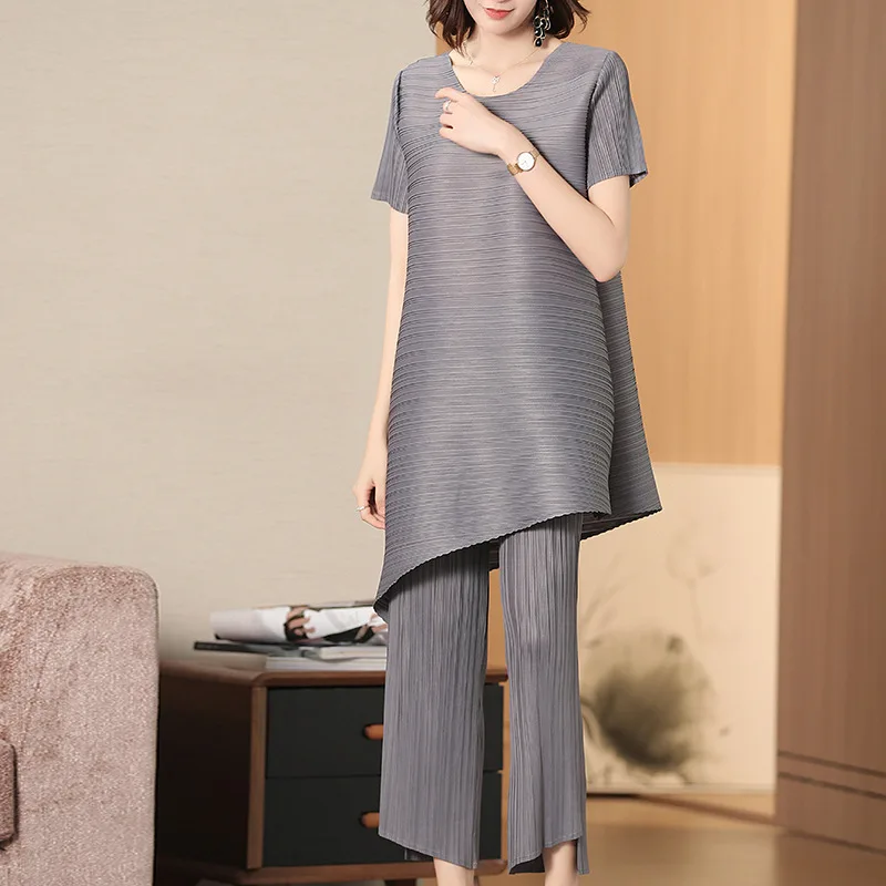 Plus Size Casual Two Piece Set New Arrival Women Summer 2019 Short Sleeve Tops and Irregular Ankle-Length Pant Hot Sale
Plus Size Casual Two Piece Set New Arrival Women Summer 2019 Short Sleeve Tops and Irregular Ankle-Length Pant Hot Sale