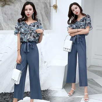 Floral Print Ruffles Shirt Pure Color Wide Leg Pants Two Piece Set Summer Fashion Ensemble Femme Survetement Wild Women's Suit
Floral Print Ruffles Shirt Pure Color Wide Leg Pants Two Piece Set Summer Fashion Ensemble Femme Survetement Wild Women's Suit