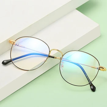 2019 new literary retro glasses frame Korean version of round flat mirror metal round frame glasses frame for men and women.
2019 new literary retro glasses frame Korean version of round flat mirror metal round frame glasses frame for men and women.
