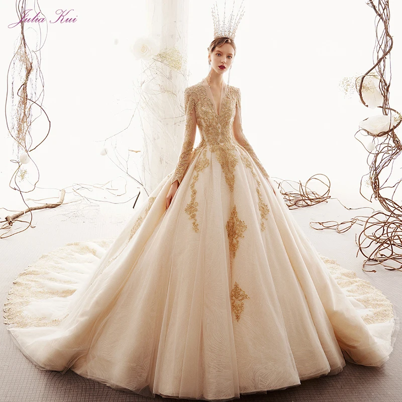 Julia Kui Beauty V-Neck Ball Gown Wedding Dress Full Sleeve Lace Up Lustrous Champagne Appliques Beaded Pearl Crystal Bride Gown
Julia Kui Beauty V-Neck Ball Gown Wedding Dress Full Sleeve Lace Up Lustrous Champagne Appliques Beaded Pearl Crystal Bride Gown