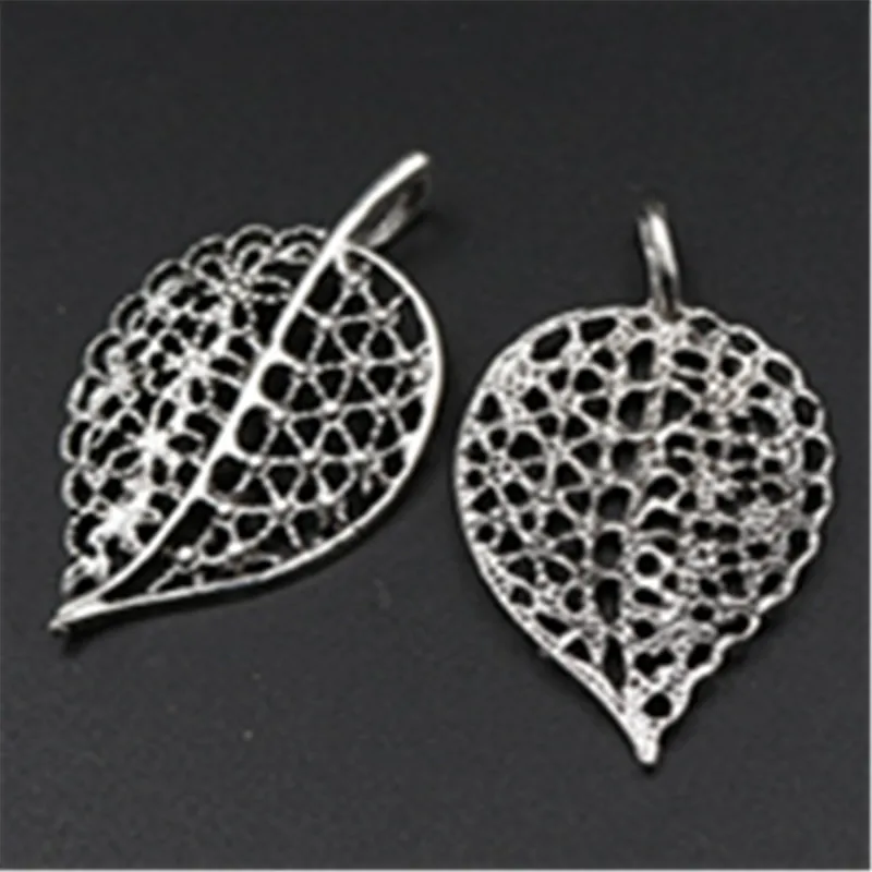 12pcs Antique silver hollow leaves charm earrings necklaces fashion ladies DIY alloy pendants A556
12pcs Antique silver hollow leaves charm earrings necklaces fashion ladies DIY alloy pendants A556