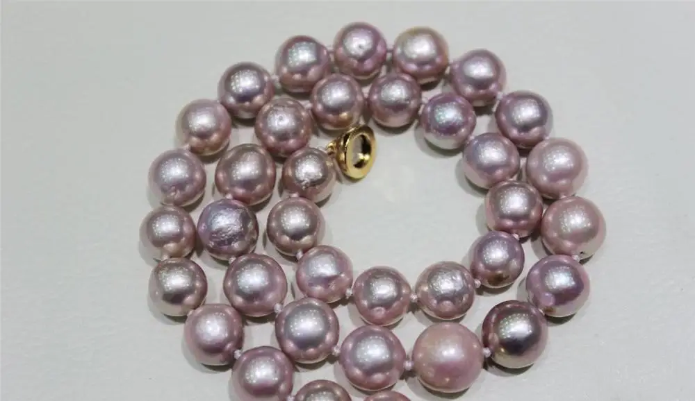 Natural purple Freshwater pearl necklace Violet 10-12mm 17.5"handmade" alloy
Natural purple Freshwater pearl necklace Violet 10-12mm 17.5"handmade" alloy