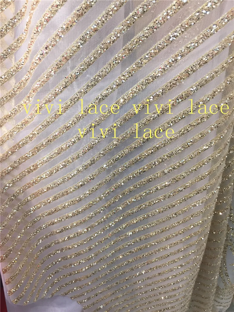 5yards/bag c02 champagne gold stripe glued glitter sparkle african india mesh tulle fabric for wedding/evening dress
5yards/bag c02 champagne gold stripe glued glitter sparkle african india mesh tulle fabric for wedding/evening dress