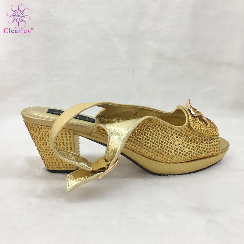 New Gold Color African Lady Sexy High Heels Pumps Decorated with Rhinestones Nigerian Design Italian Slipper for Wedding Party
New Gold Color African Lady Sexy High Heels Pumps Decorated with Rhinestones Nigerian Design Italian Slipper for Wedding Party
