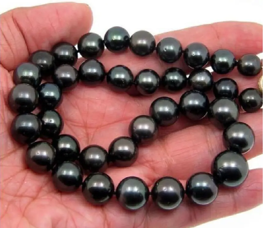 Jewelr 006460 Real natural 10-11mm south sea black pearl necklace 18" 14KGP yellow Gold Clasp
Jewelr 006460 Real natural 10-11mm south sea black pearl necklace 18" 14KGP yellow Gold Clasp