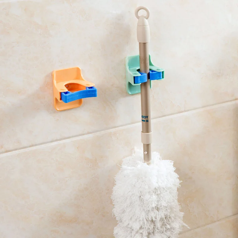 Strong-Adhesive-Mop-Towel-Bathroom-Free-Punch-Sweep-Porter-Bathroom-Suction-Wall-Mop-Clip-Holder (2)