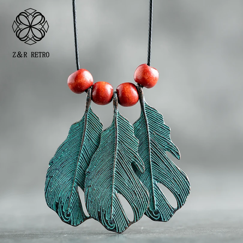 Zinc Alloy Rope Chain Necklace Feather Pattern Design Neck Pendant Female Vintage Jewelry Necklaces Women Fashion Long Necklace
Zinc Alloy Rope Chain Necklace Feather Pattern Design Neck Pendant Female Vintage Jewelry Necklaces Women Fashion Long Necklace