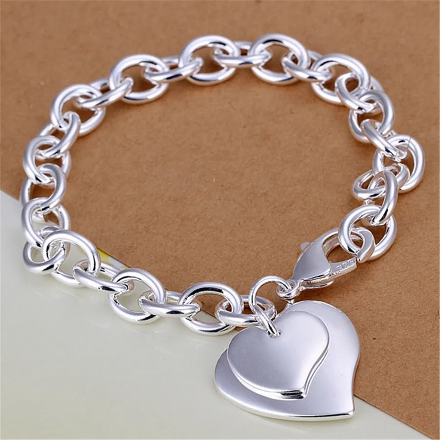 Фото Модные изысканные серебряные браслеты с двойным сердцем новые