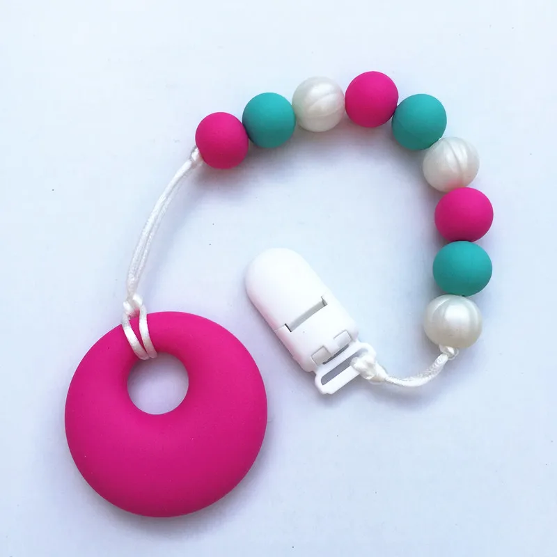 Silicone teething Pacifier Clips BPA Free Baby round pendant Teether Silicone Bead Clip Holder Pacifier Soother For Baby
Silicone teething Pacifier Clips BPA Free Baby round pendant Teether Silicone Bead Clip Holder Pacifier Soother For Baby