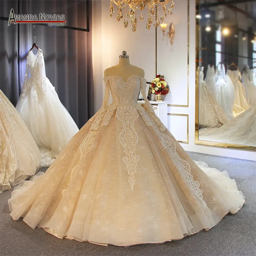 Luxury champagne color wedding dress with long train customer order color and sizes
Luxury champagne color wedding dress with long train customer order color and sizes