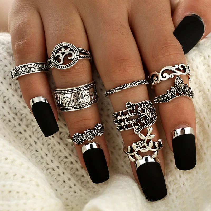 pack of 9 combination knuckle rings with vintage carved flower /palm and elephant design in burnished in silver tone
pack of 9 combination knuckle rings with vintage carved flower /palm and elephant design in burnished in silver tone
