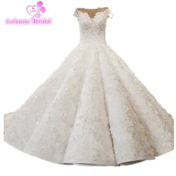AOLANES New Luxurious Lace Appliques Beaded V Neck Puffy Wedding Gown Champange Wedding Dress Wave Skirt 3D Flower Bridal Dress
AOLANES New Luxurious Lace Appliques Beaded V Neck Puffy Wedding Gown Champange Wedding Dress Wave Skirt 3D Flower Bridal Dress