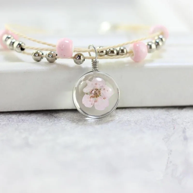 Dried Flower Charm Bracelets Ceramic Beads Bohemia Style Multilayer Clove Bracelets Weave Chain Elegant Flower Bracelets
Dried Flower Charm Bracelets Ceramic Beads Bohemia Style Multilayer Clove Bracelets Weave Chain Elegant Flower Bracelets