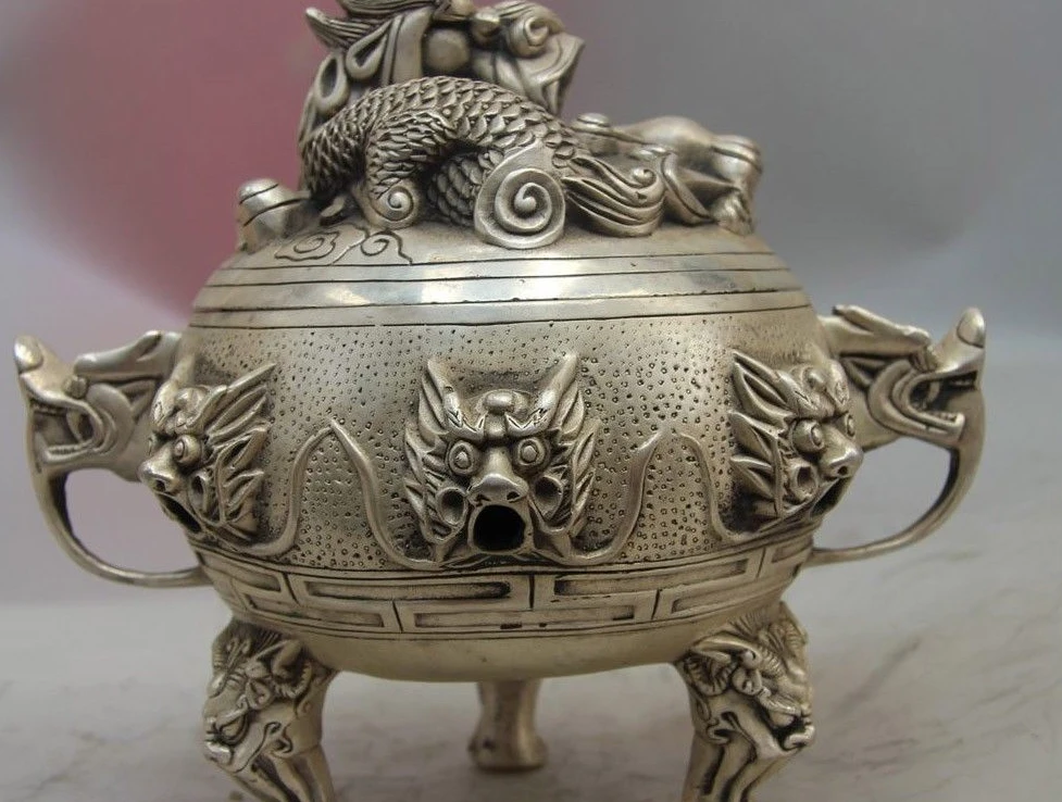 Горелка для курильницы китайская буддистская Fane из белой меди и серебра с девятью головами дракона
Горелка для курильницы китайская буддистская Fane из белой меди и серебра с девятью головами дракона