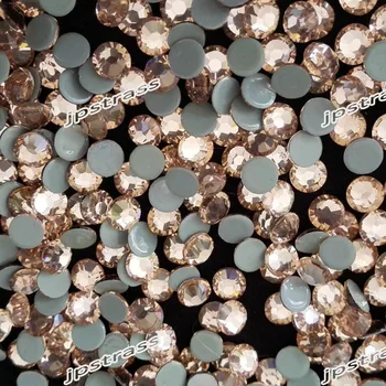 

6mm lt peach color with 288 pcs per pack ;14 cutting facets stones free shipping on line hot fix rhinestones supplier