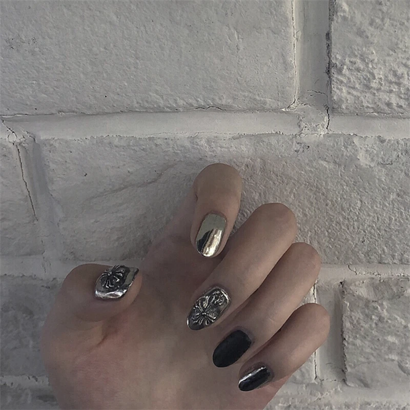 American punk style Black and smoky gray hit pure color with Chrome Hearts pattern false nails Bride full nail tips fake nails
American punk style Black and smoky gray hit pure color with Chrome Hearts pattern false nails Bride full nail tips fake nails