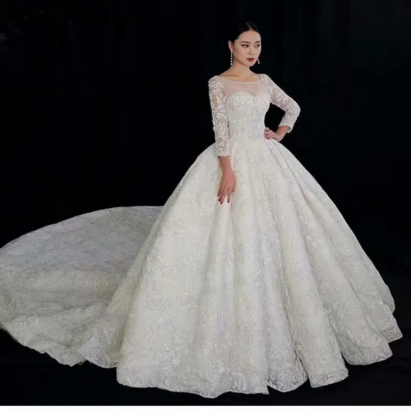 High Quality Lace Ball Gowns Wedding Dresses for Women Pearls Corset Princess Long Sleeves Sheer Neck Bridal Gowns 2019
High Quality Lace Ball Gowns Wedding Dresses for Women Pearls Corset Princess Long Sleeves Sheer Neck Bridal Gowns 2019