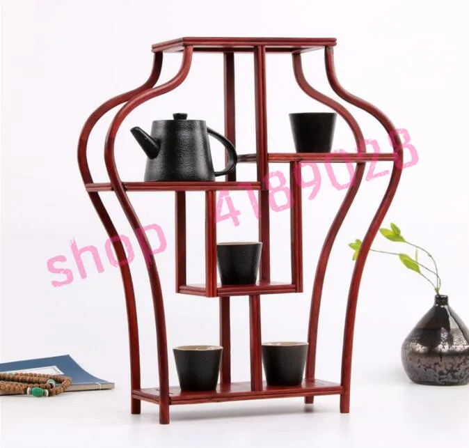Blood sandalwood, vase style, solid wood curio shelves, ornaments pendulum frame.
Blood sandalwood, vase style, solid wood curio shelves, ornaments pendulum frame.