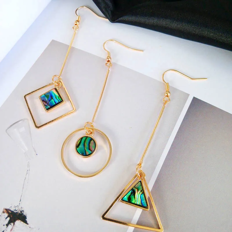 Europe and the United States original color shells minimalist geometric circular square pendant long triangle earrings earrings
Europe and the United States original color shells minimalist geometric circular square pendant long triangle earrings earrings