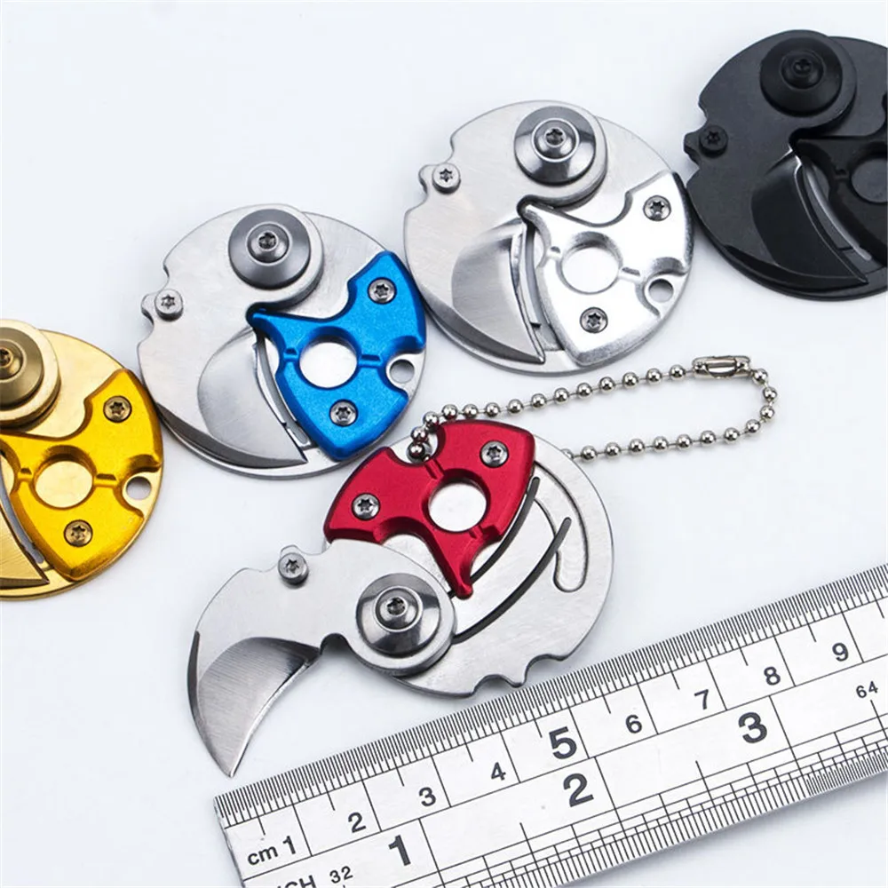 B-64 Coin small Knife Portable Keyboard Knives Mini Outdoor Folding Stainless Steel Fruit Knife present Key Chain 5 color choose 
B-64 Coin small Knife Portable Keyboard Knives Mini Outdoor Folding Stainless Steel Fruit Knife present Key Chain 5 color choose