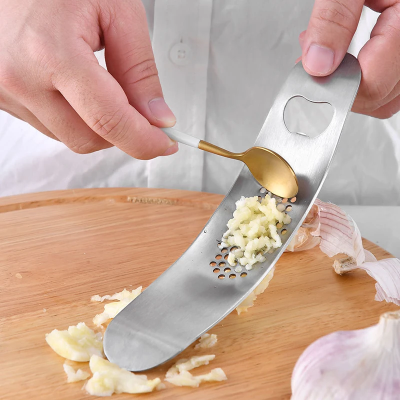 Stainless Steel Curved Manual Garlic Press Boat Type Two-in-one Bottle Opener Pressed Garlic Grinder
Stainless Steel Curved Manual Garlic Press Boat Type Two-in-one Bottle Opener Pressed Garlic Grinder