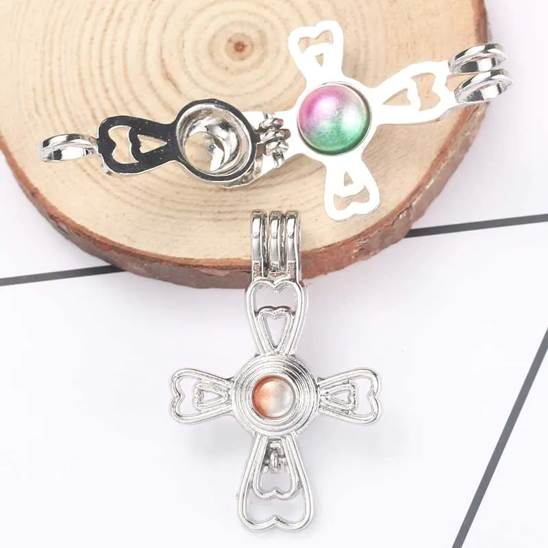 5pcs Silver Cross Heart Shape Pearl Cages Pendant Jewelry DIY Beads Cage Necklace Aroma Essential Oil Diffuser Box Oyster Pearl
5pcs Silver Cross Heart Shape Pearl Cages Pendant Jewelry DIY Beads Cage Necklace Aroma Essential Oil Diffuser Box Oyster Pearl