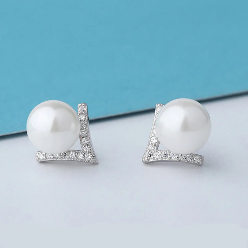 Sterling silver 925 girl Trendy geometric stud earrings V Cubic Zircon plated with shell Pearl 2019 Hot sale jewelry
Sterling silver 925 girl Trendy geometric stud earrings V Cubic Zircon plated with shell Pearl 2019 Hot sale jewelry