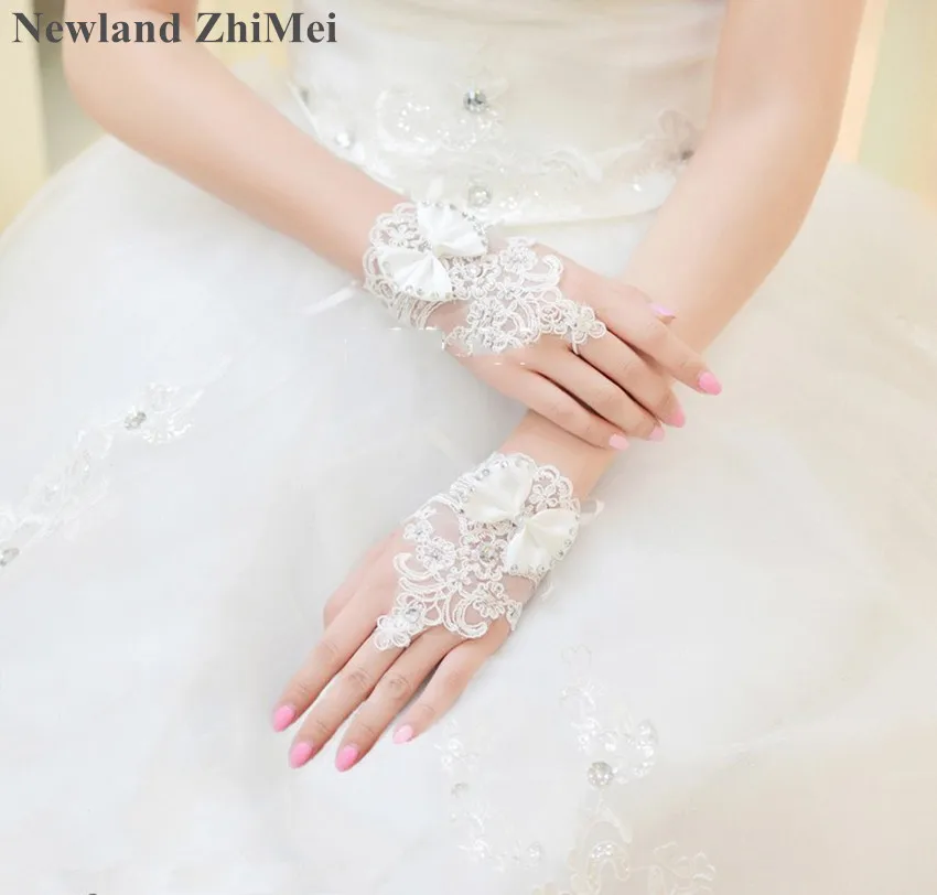 Newland ZhiMei Cheap Ivory Fingerless Gloves Short Paragraph Elegant Rhinestone Bridal Wedding Gloves Accessoire Mariage 2019
Newland ZhiMei Cheap Ivory Fingerless Gloves Short Paragraph Elegant Rhinestone Bridal Wedding Gloves Accessoire Mariage 2019