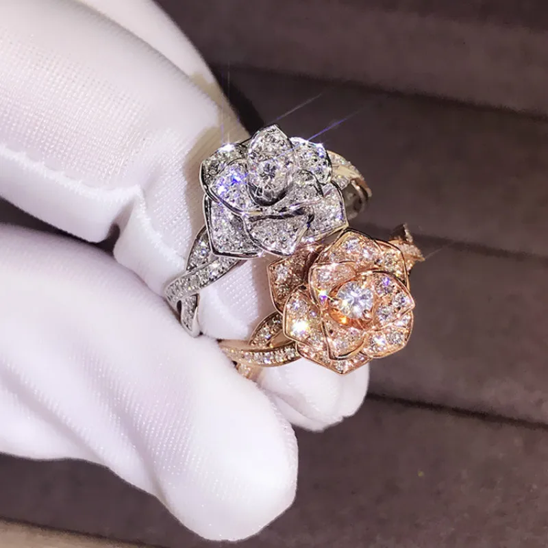 Luxury inlaid zircon flower crystal ring female European and American engagement wedding ring
Luxury inlaid zircon flower crystal ring female European and American engagement wedding ring