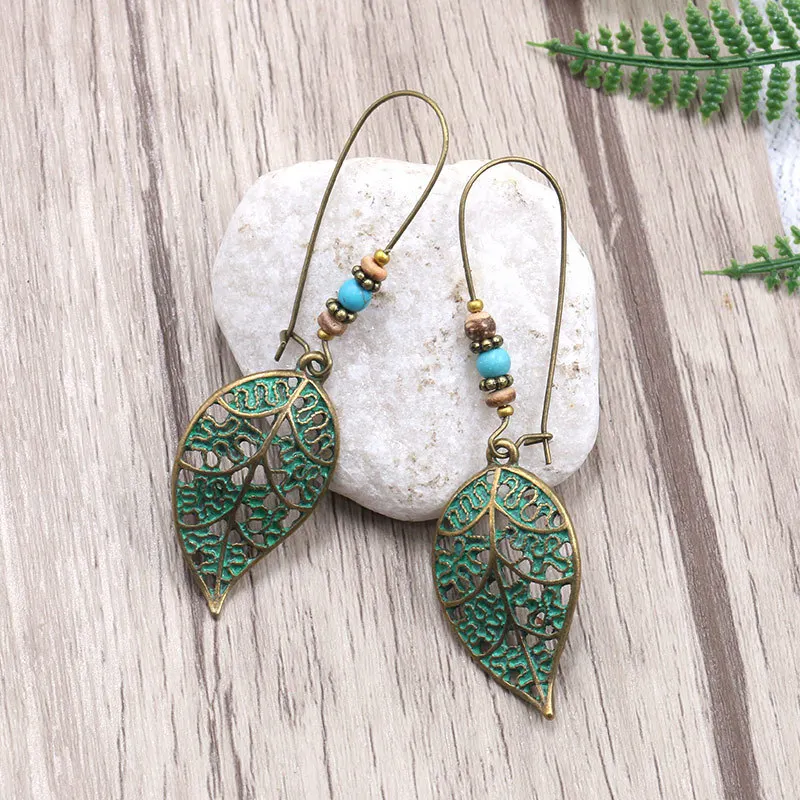 Hollow Out Tree Leaves Women Drop Earring Antique Alloy Ear Hook Elegant Female Jewelry Personalized Gift Hanging Brinco New 
Hollow Out Tree Leaves Women Drop Earring Antique Alloy Ear Hook Elegant Female Jewelry Personalized Gift Hanging Brinco New