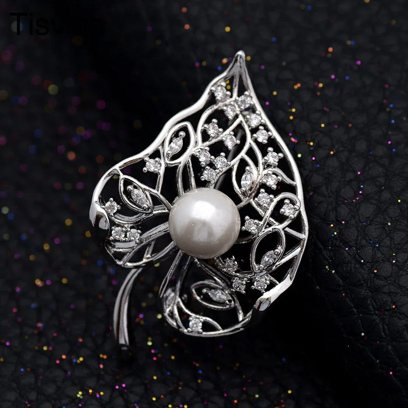 Tisvina Silver Color Pearl zircon Hollowed Leaf Women Brooches Office Lady Commuter jewelry Fashion atmosphere Pins Brooch Gift
Tisvina Silver Color Pearl zircon Hollowed Leaf Women Brooches Office Lady Commuter jewelry Fashion atmosphere Pins Brooch Gift